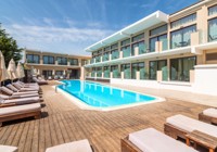 Outdoor pool area at Selyria Resort