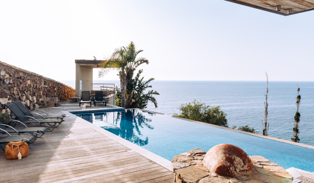 View of Pool overlooking the sea at Aquamarine Villa