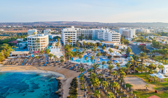 Aerial View of Adams Beach Hotel and Surrounding Area