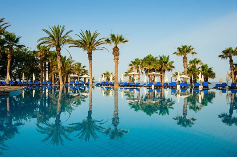 A resort pool beside the sea in Cyprus