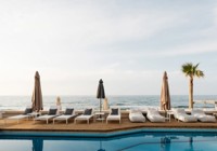 Outdoor pool at Petradi Lounge Beach Hotel